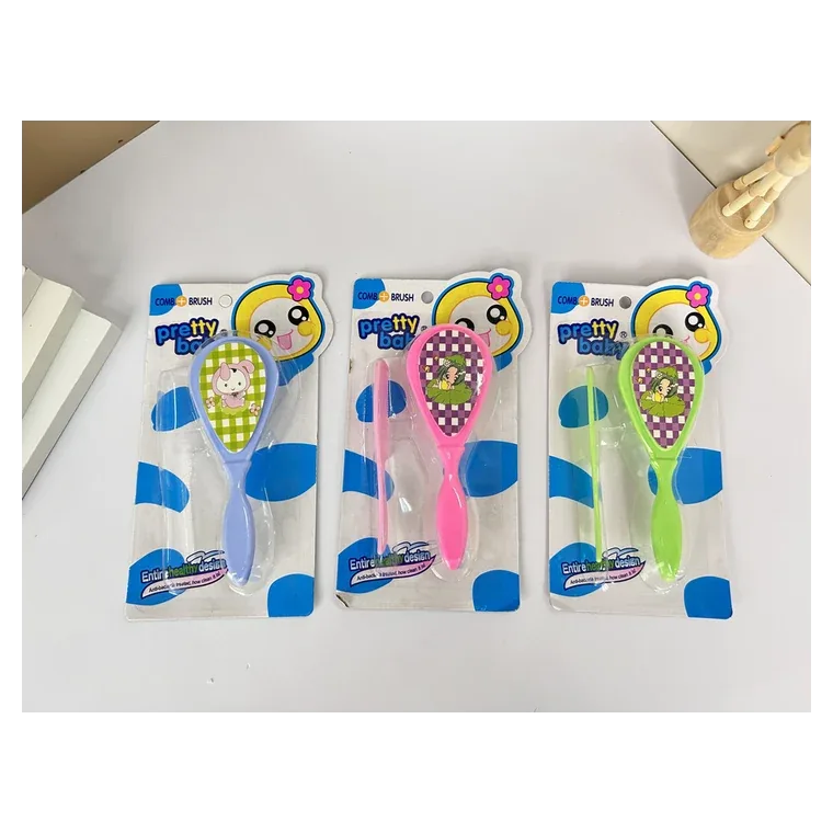 Comb brush, listed in pink, blue, green